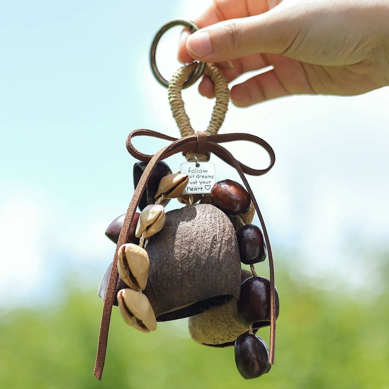 Forest-style hand-cranked bell bag charm made of natural fruit shells, a sound-healing souvenir gift