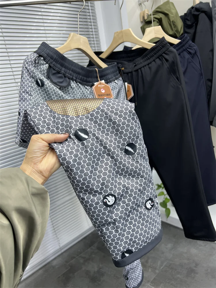 

aphene Knee Pad down Pants White Goose Feather Thiened Warm Casual Loose Fit Men's Winter Elastic Waist down Pants