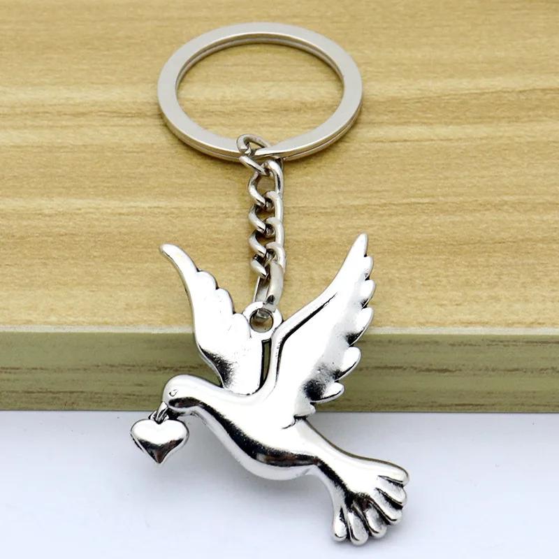 Catholic Christianity Jesus Holy Spirit Peace Dove Retro Jewelry Necklace Exquisite Car Keychain Pendant Keychain Wholesale