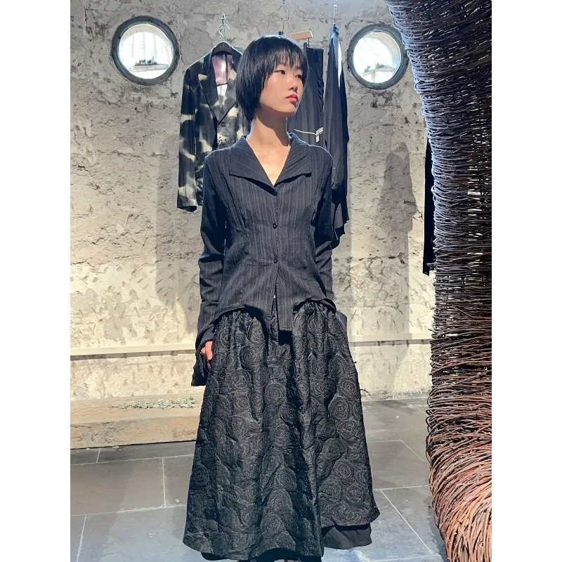 Falda negra Vintage Floral de cintura alta elástica para mujer, faldas por debajo de la rodilla informales holgadas, ropa elegante de moda para primavera y otoño 2025