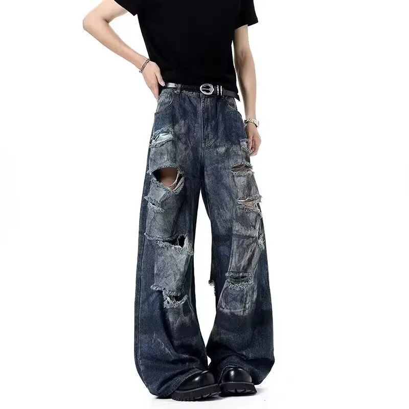 بنطلون جينز أزرق مغسول بفتحات أمريكية عتيقة للرجال 2025 جديد فضفاض غير رسمي بخصر مطاطي مطبوع عليه قذرة سروال طويل من قماش الدنيم