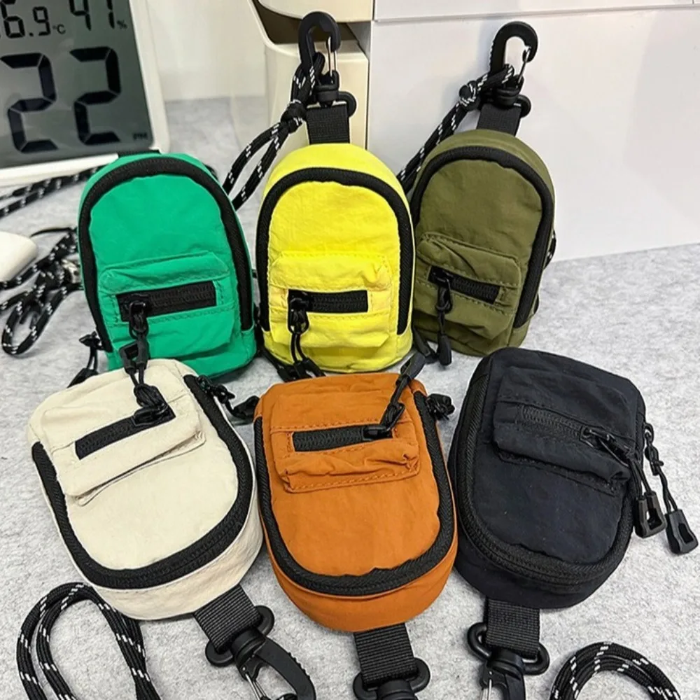 

Нейлоновый подвесной кошелек для монет на шею, многофункциональный корейский стиль, ремешок на плечо, сумка для хранения наушников, сумка для наушников в стиле хип-хоп, губная помада