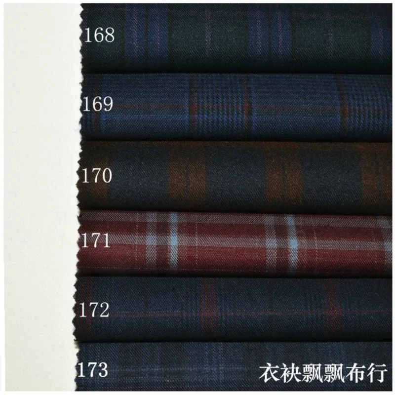 The suit is made of high-count fine-spun fabric in dark green deep blue and purplish red for trousers skirts