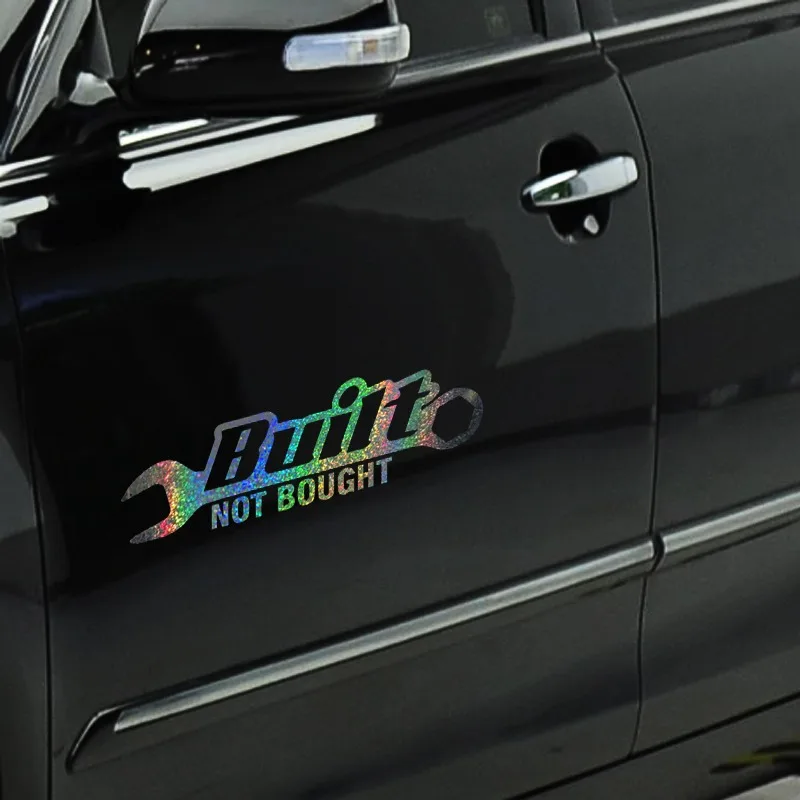 สติกเกอร์ติดรถยนต์ 1 ชิ้น ลายข้อความภาษาอังกฤษว่า “Built Not Bought” ดีไซน์รูปประแจ สำหรับตกแต่งรถยนต์ แล็ปท็อป และอุปกรณ์อื่นๆ