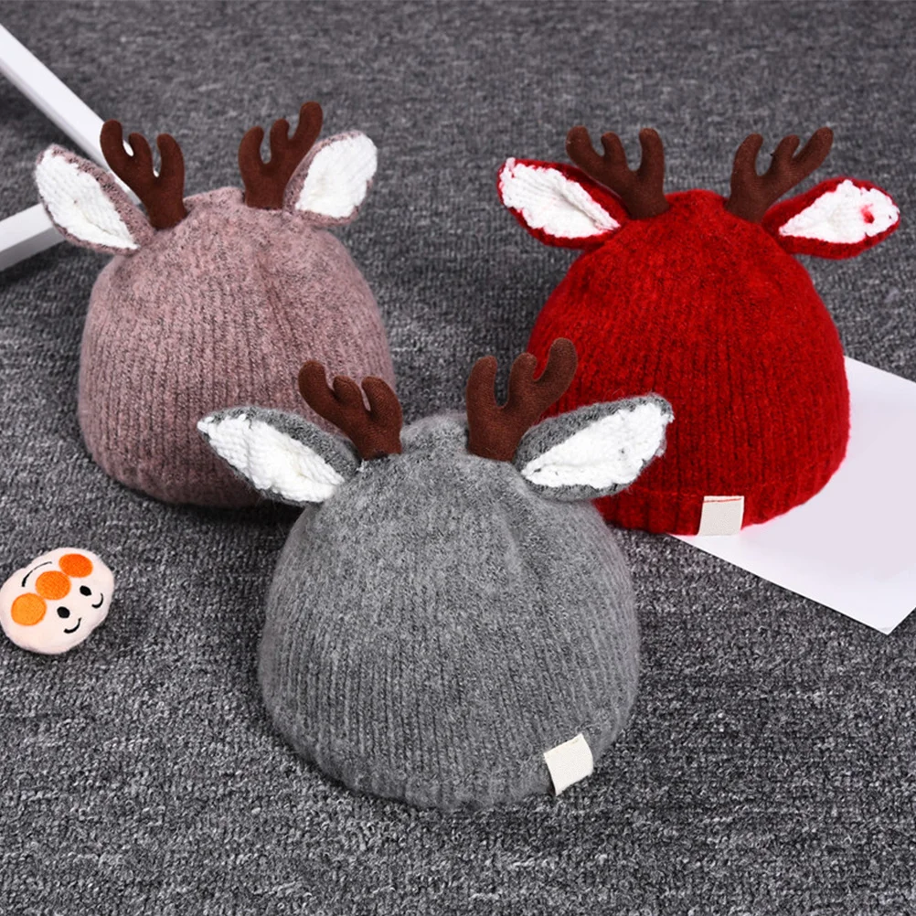 قبعة أطفال محبوكة من الصوف على شكل قرون وردي للخريف والشتاء بتصميم دافئ قابل للتمدد من عمر 0 إلى 3 سنوات قبعة عيد الميلاد