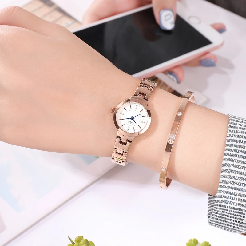 Small round women\'s watch steel belt simple scale casual small student watch waterproof quartz women\'s watch