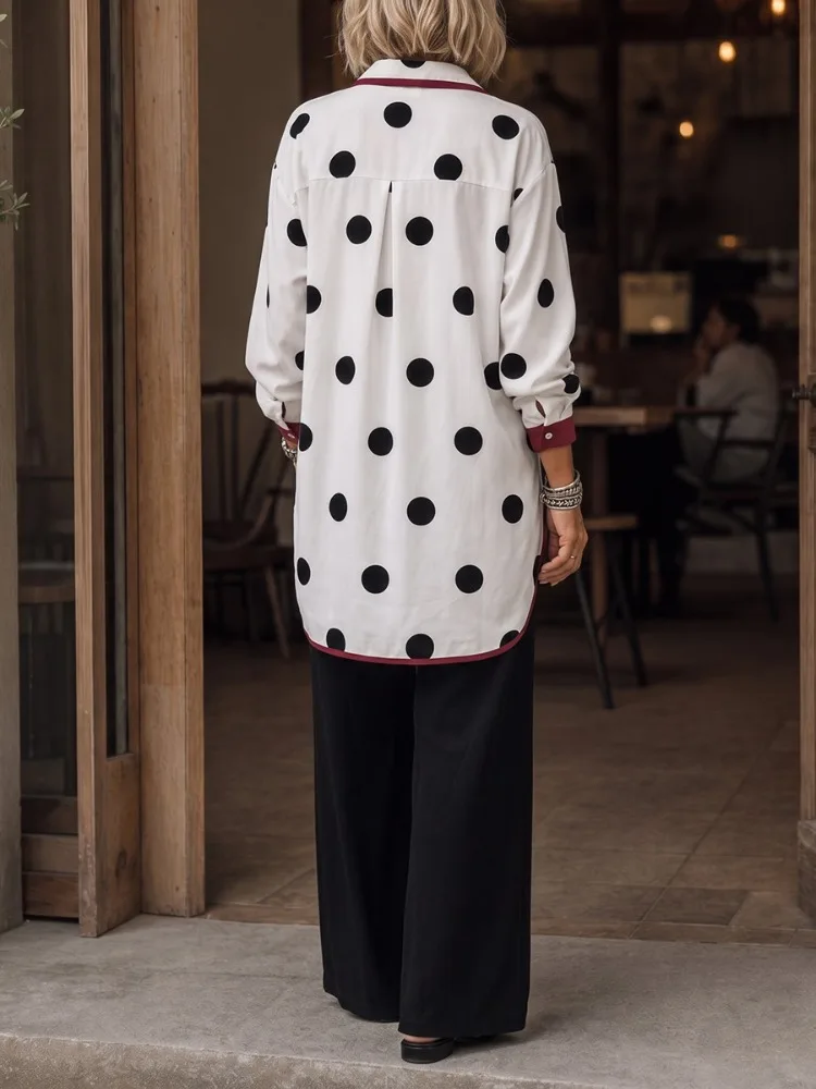 Yeezzi Women's Trendy Black Polka Dot Lapel Shirt 2026 Long Sleeves Buttoned Contrast Color High‑Low Hem Office Commuting Blouse