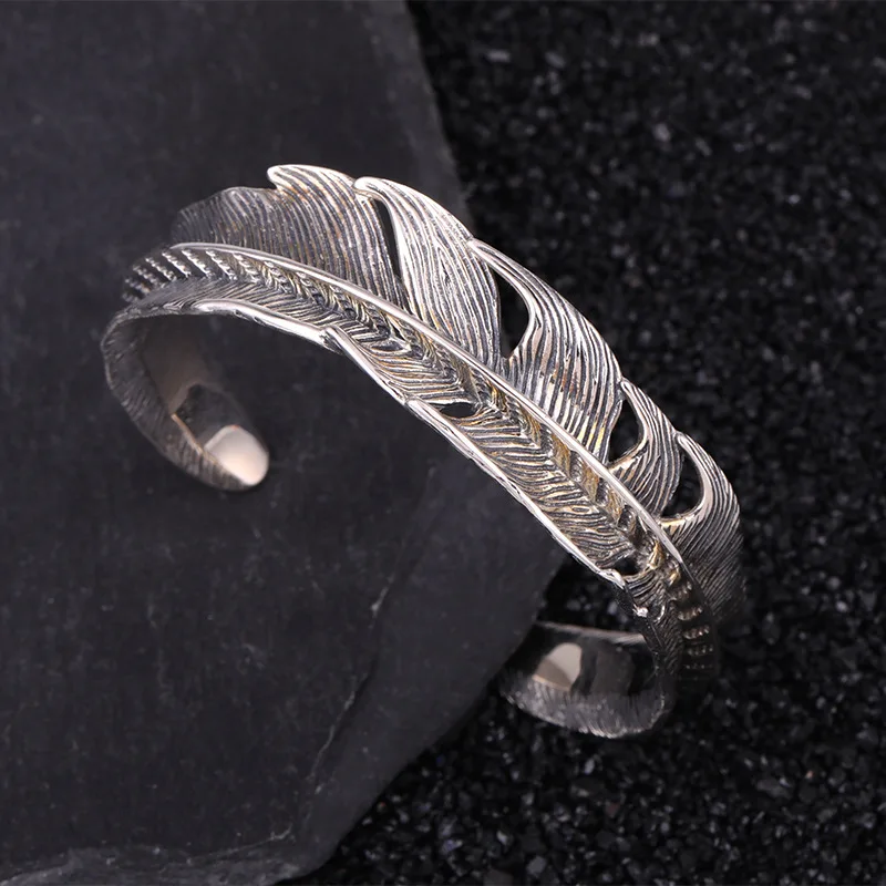 

Retro Japanese and Korean feather bracelet men's domineering open personalized wide 925 sterling silver bracelet female hipster