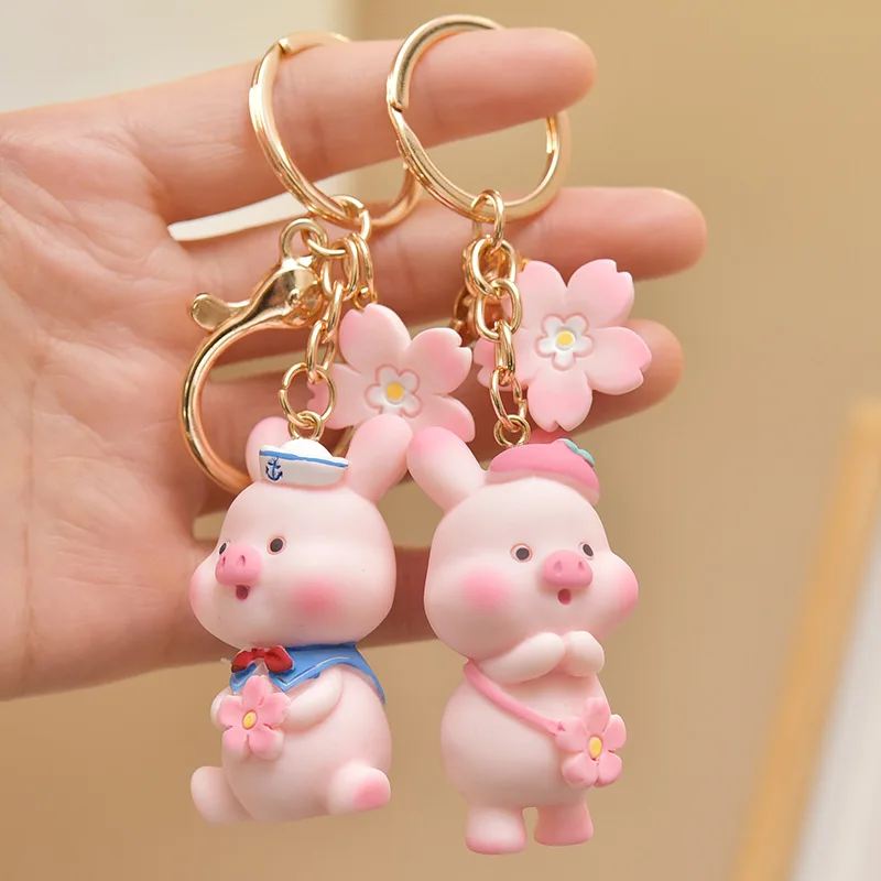 Three Dimensional PVC Soft Glue 2023 New Cute Raincoat Piglet Keychain Kawaii Milk Satchel Pig Doll for Woman Bag Key Pendant