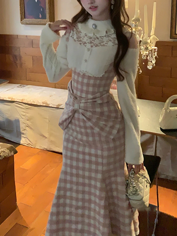 

Новая женская осенне-зимняя юбка-платье в клетку с длинным рукавом, завязками на талии, эффектом утяжки и стройнящим силуэтом.