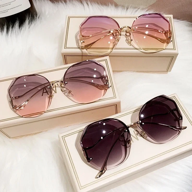 2023 Borderless Trimmed Fashionable Sunglasses Women UV Protection Irregular Round Oversized Sunglasses Ocean Lense SunGlasses