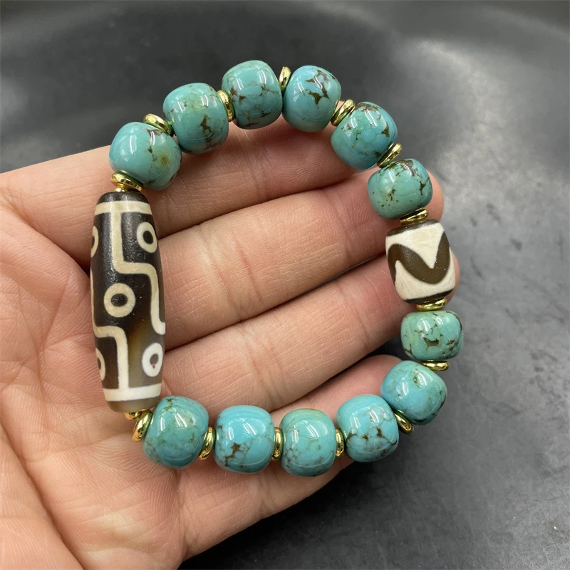 

Optimized turquoise old-style , nine-eye dzi bead agate bracelet