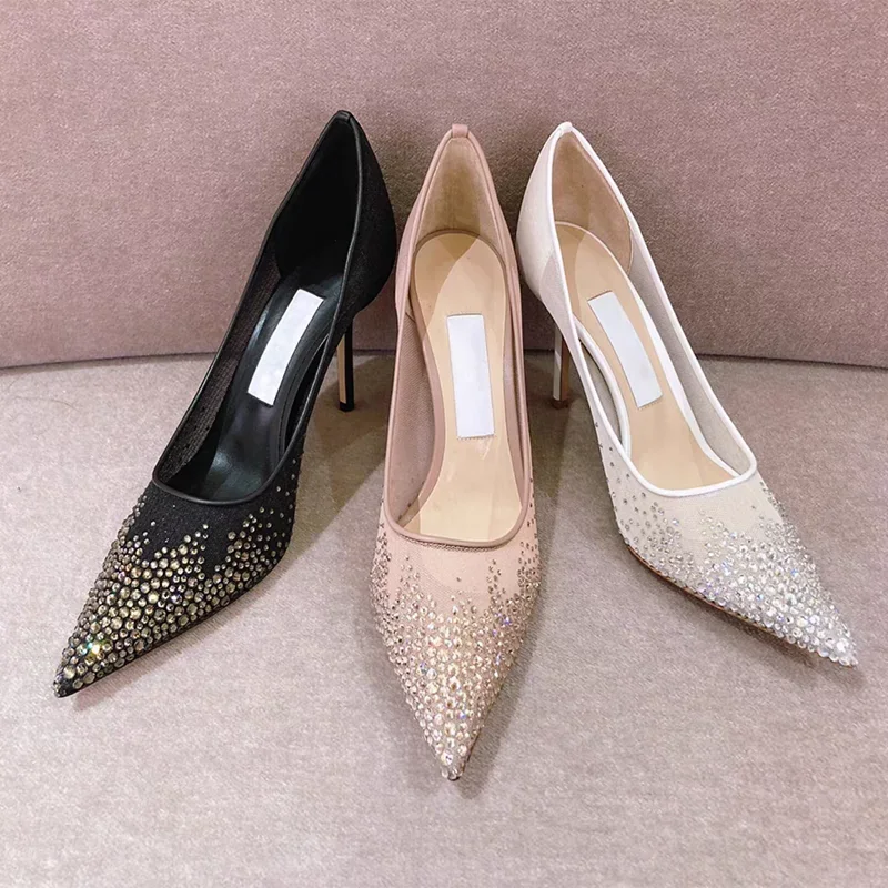 2025 Zapatos de moda sexys de boca baja con tacones altos puntiagudos de malla para mujeres europeas y americanas