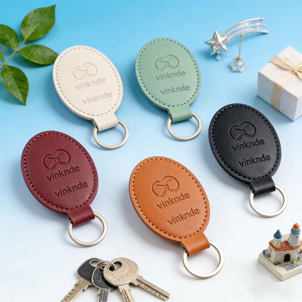 

Handmade Luxury Keyring Oval Shape PU Leather Sublimation Keychain Custom Embossed Logo Keychain Simple Spring Coil Clip Safe