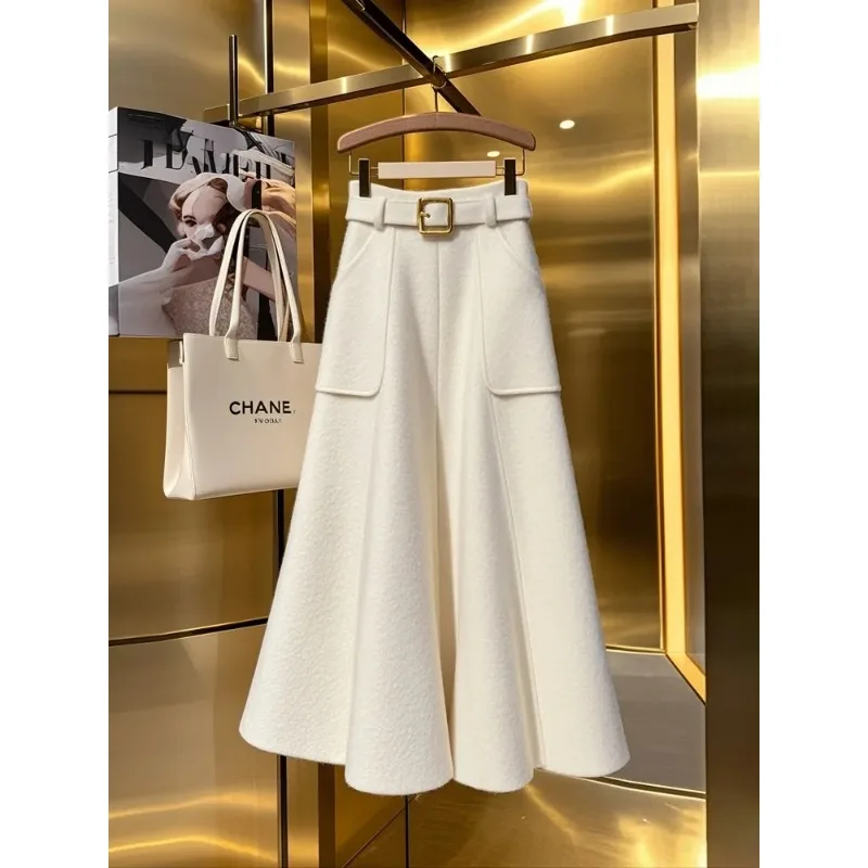 

Осень-зима 2025 г., модная белая утолщенная юбка трапециевидной формы средней длины для женщин, повседневная и элегантная юбка трапециевидной формы