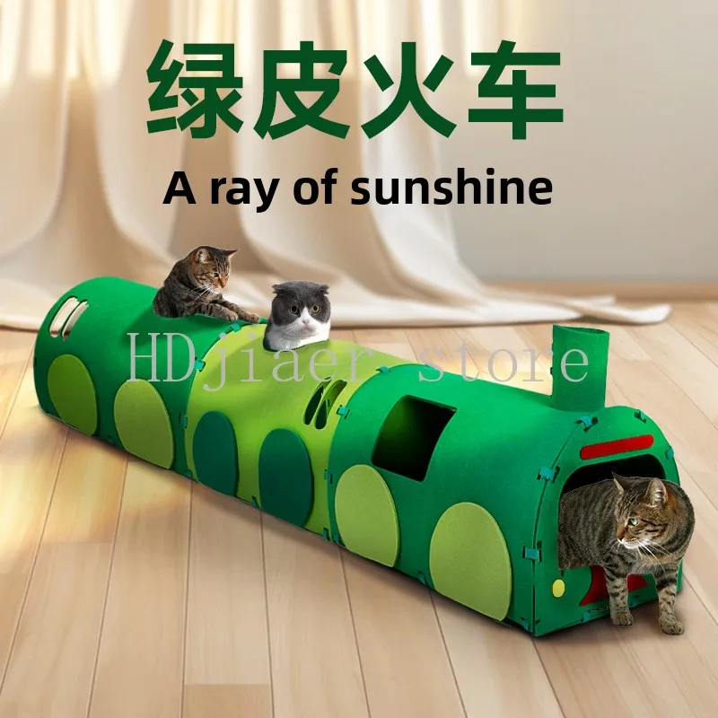 

Green train-shaped toy, a three-in-one combination of cat tunnel, scratch board, and bed