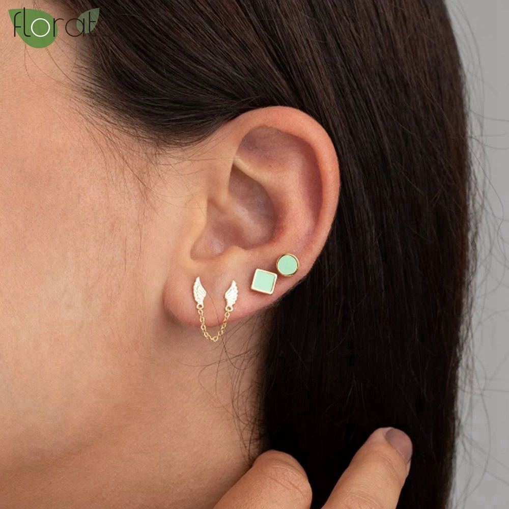 女性用ペンダント付きダブルイヤーイヤリング,ゴールドカラー,エンジェルスイング,ピアスジュエリー,ファッショナブルなギフト,新しいコレクション2024