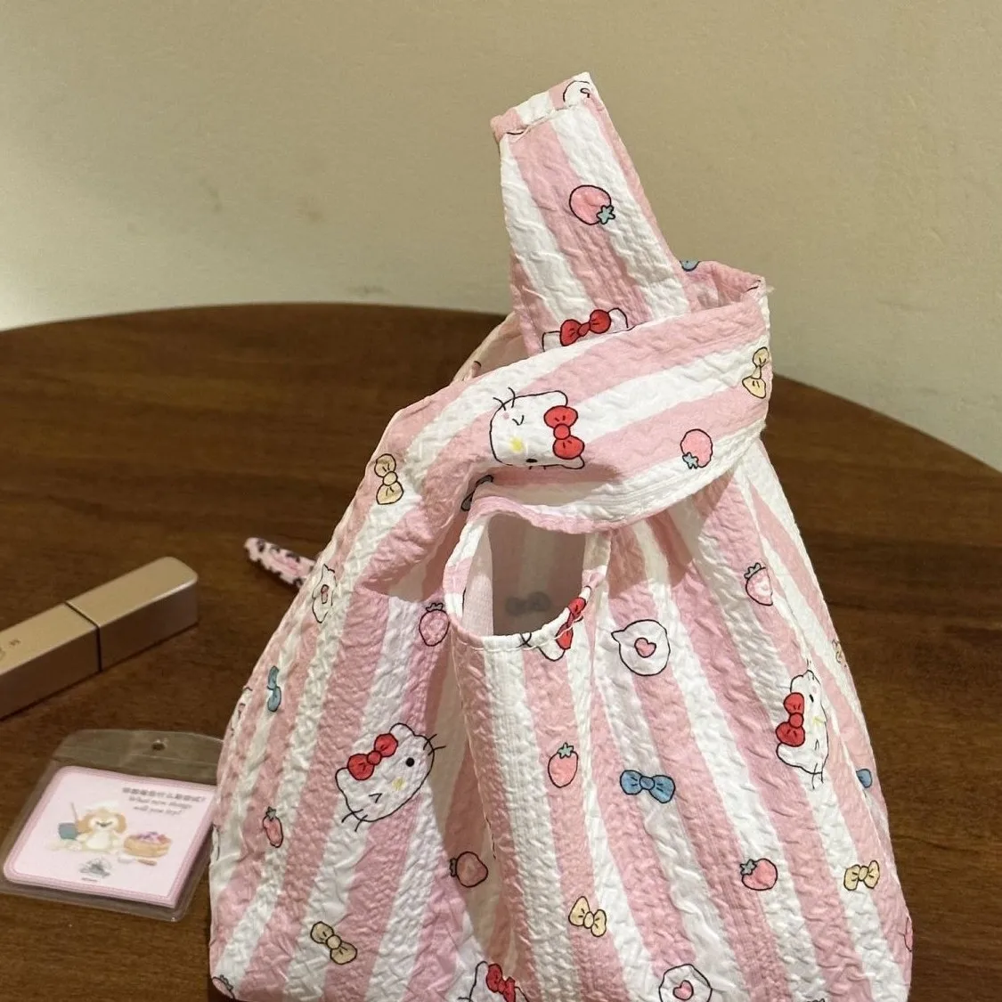 Sacs à main imprimés Hello Kitty, sacs à Bento de dessin animé, fourre-tout de banlieue décontracté pour femmes, sacs de poignet d'extérieur, sacoche mignonne, cadeaux de noël