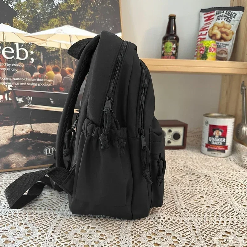 Schüler rucksack mit großer Kapazität, lässiger wasserdichter Nylon rucksack, modische Grund-und Mittels chüler tasche