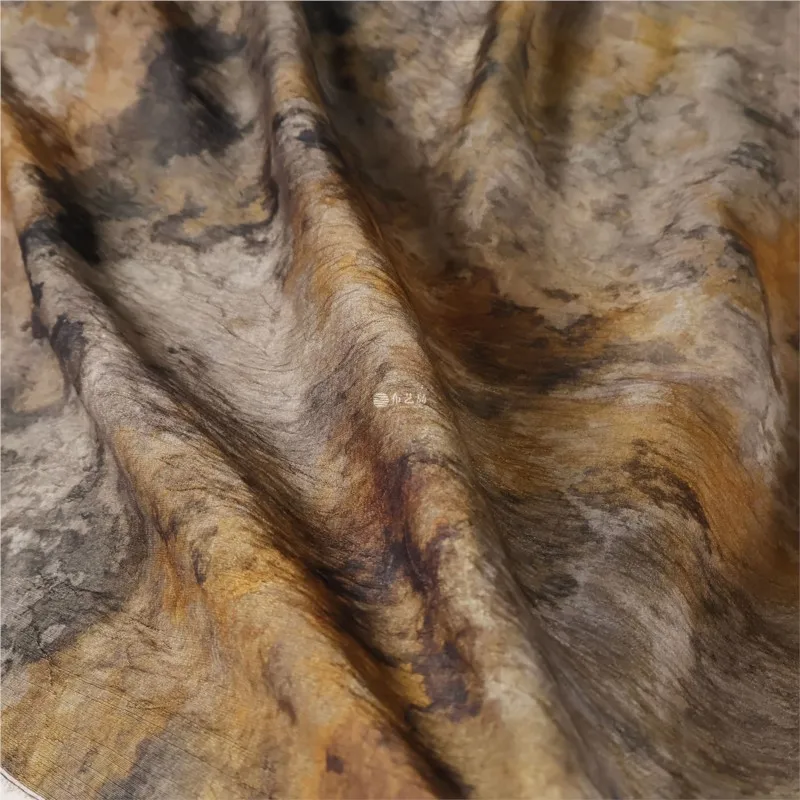 The fabric for Hanfu and ancient costume skirts is a slightly artistic brownish tie-dyed dark-patterned jacquard linen
