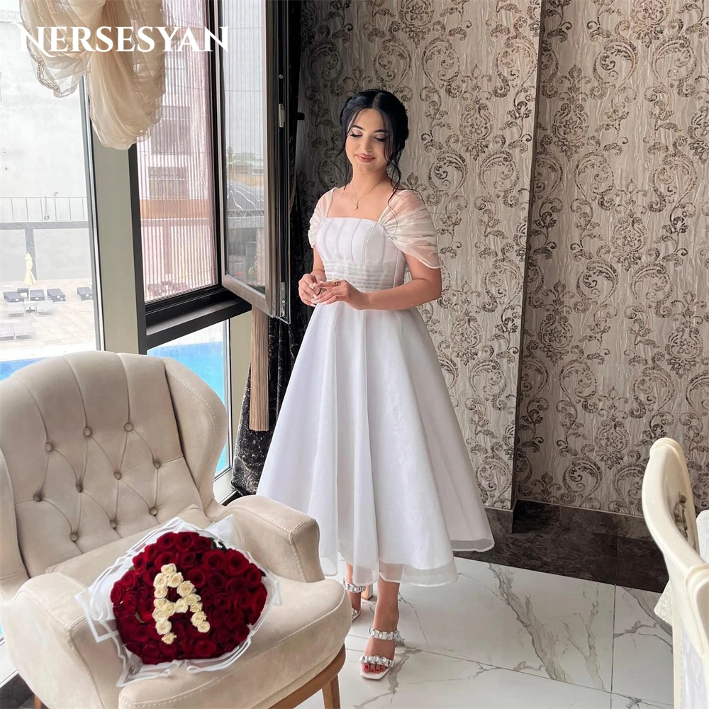 

Nersesyan Elegant Pure Wedding Dresses Bones Off Shoulder Corset A-Line Tea Length Bridal Gowns Backless Bride Dress Dubai 2024