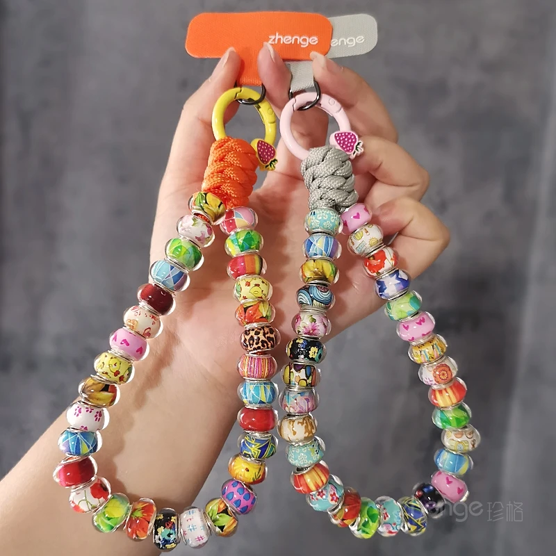 

Glass colored bead mobile phone lanyard, women's wrist short bead woven lanyard, universal lanyard for mobile phone cases