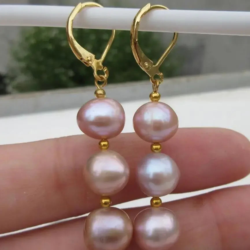 

Gorgeous A pair of natural bizarre south seas pink purple pearl earrings 14k/20