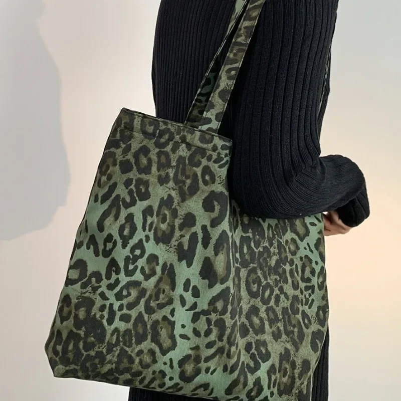 Moda simples leopardo impressão lona sacolas para mulheres tendência lazer estudante grande capacidade de armazenamento bolsa ombro bolsas