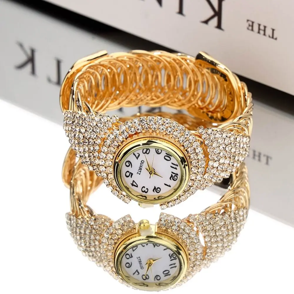 

Elegance Gold Bracelet Watch Alloy Heart Quartz Watch Round Crystal Wrist Watches Women