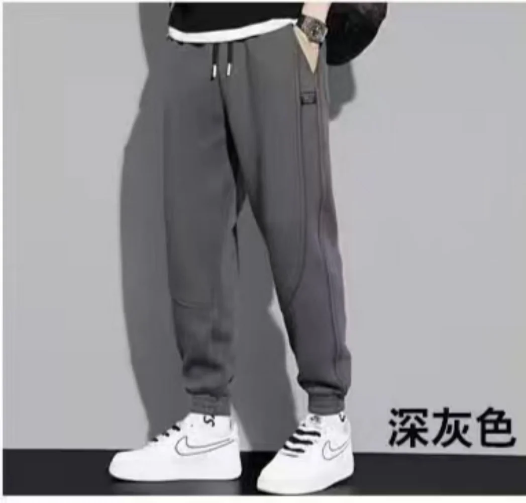 

Новые спортивные брюки для мужчин, повседневные спортивные брюки, повседневные универсальные брюки, модные повседневные брюки четырехсезонного цвета 2025 года.