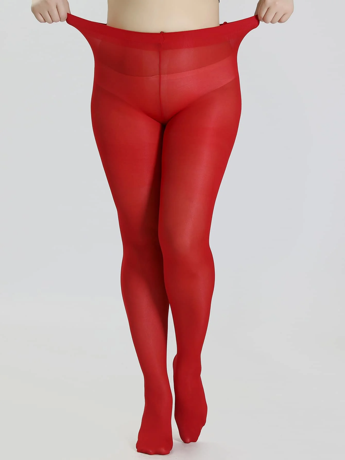 A pair of red women\'s fashionable oversized pantyhose