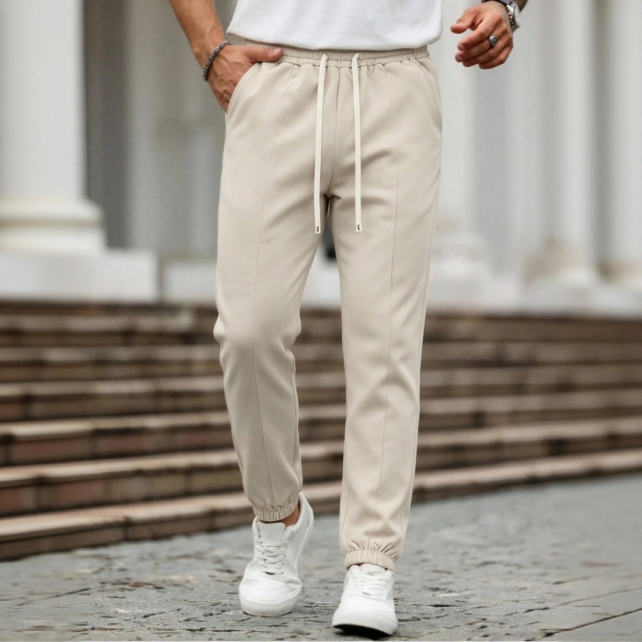 Casual Men Solid Beige Jogger Trousers Front Vertical Seam Elastic Waist Long Drawstring Cuffed Ankle Loose‑Fit Daily Male Pants