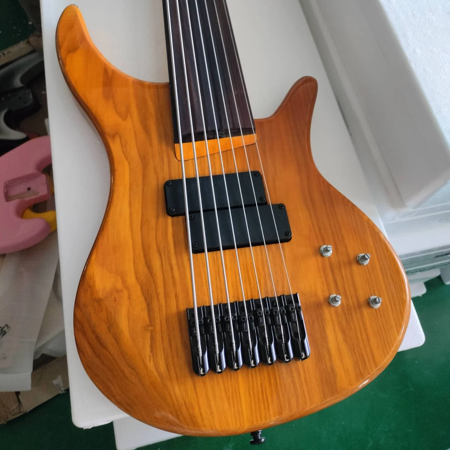 

7 String Fretless Electric Bass Guitar with Black Hardware, Mahogany Body Maple Neck Rosewood Fingerboard, 7-String Bass