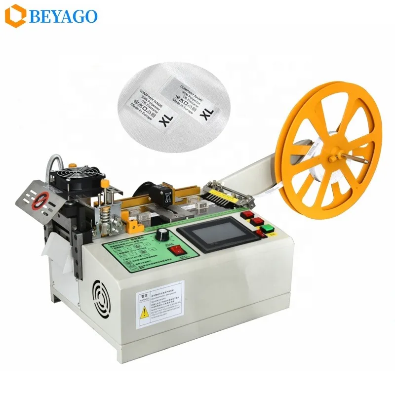 [Le più vendute] Tagliatrice automatica a caldo freddo del nastro dell'etichetta del nastro del tessuto del miglior prezzo