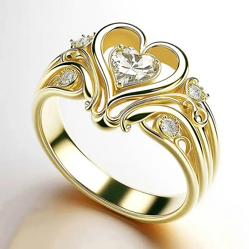 Huitan herzförmiger goldfarbener Ring für Frauen, elegantes Accessoire für Hochzeitsfeiern mit glänzendem CZ-Liebes-Jubiläumsschmuck, Geschenk