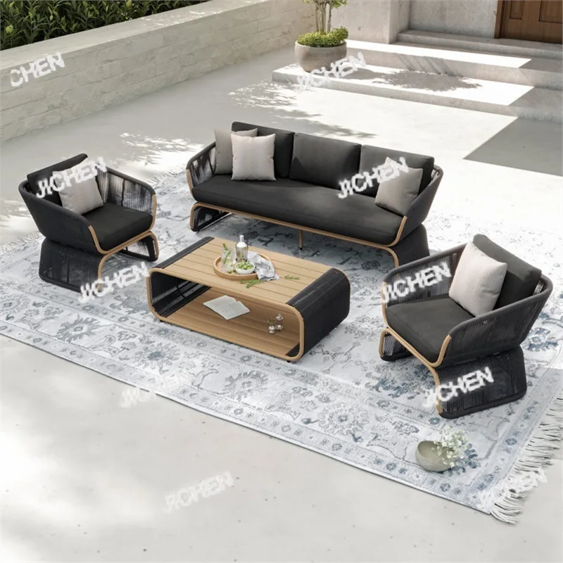 ชุดโซฟาหวายกลางแจ้ง JC สำหรับระเบียงบ้านพักตากอากาศ พร้อมโต๊ะกาแฟ ป้องกันฝนและแสงแดด เหมาะสำหรับสวนและวิลล่า