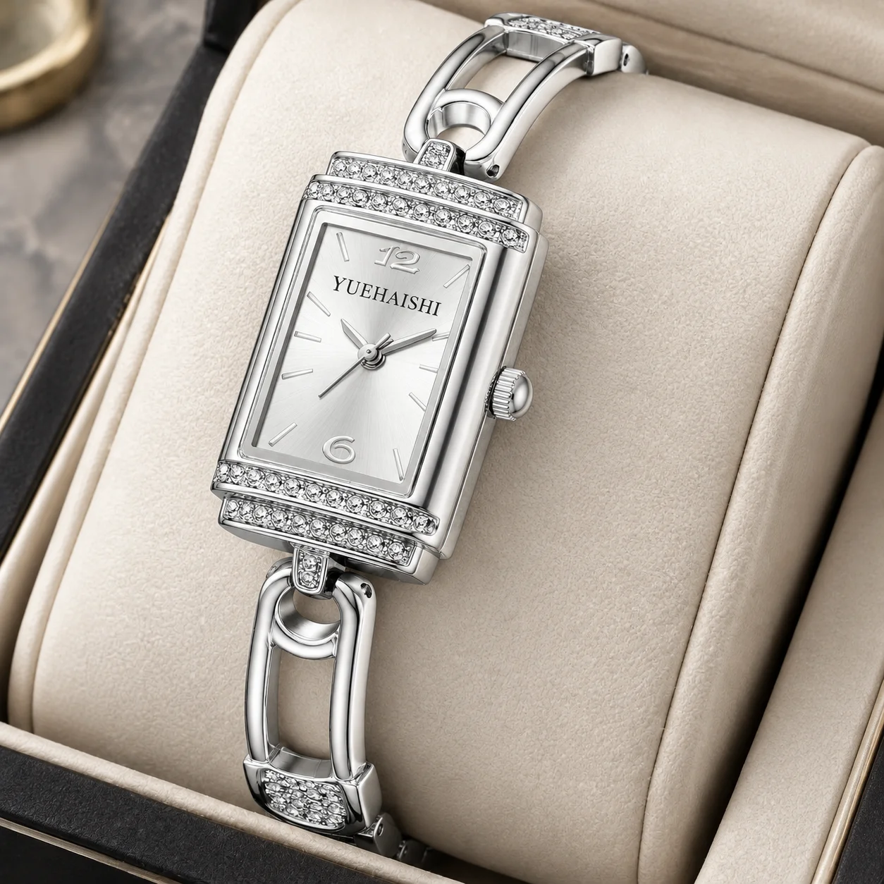 Elegant ladies' watches with vintage square dial design and geometric skeletonized straps,