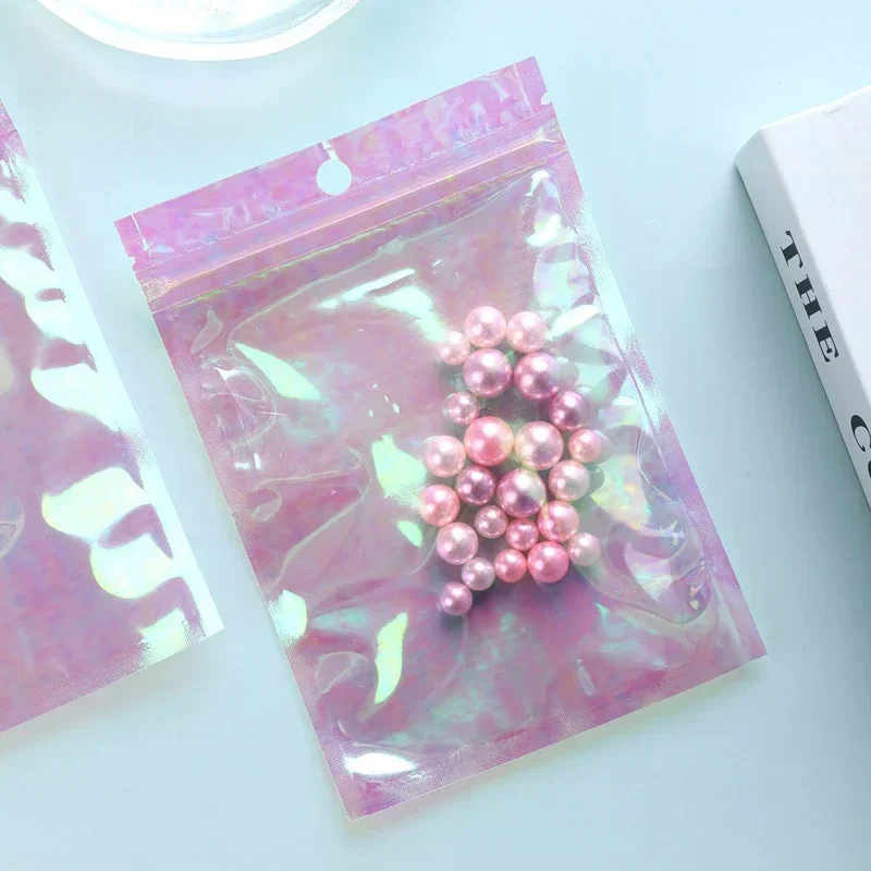 Zipper Packaging Bubble Bag 100pcs Pink Stand Up Holographic Flat Pouches Small Laser Zip Lock Plastic Bags for Cosmetic Jewelry