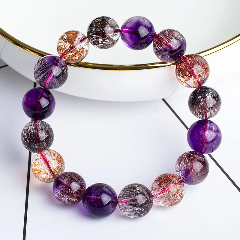 

Natural Super Seven Crystal Boutique Tourmaline Hair Crystal Agate Hair-Free Olivine Moonstone Sugilite Gold Sun Bracelet