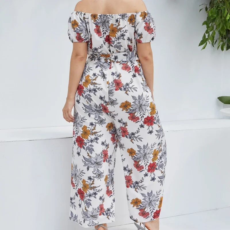 Plus Size Floral Print Eleganckie letnie kombinezony damskie z ukośnym dekoltem i krótkim rękawem z szerokimi nogawkami Casual Boho Jumpsuits Duży