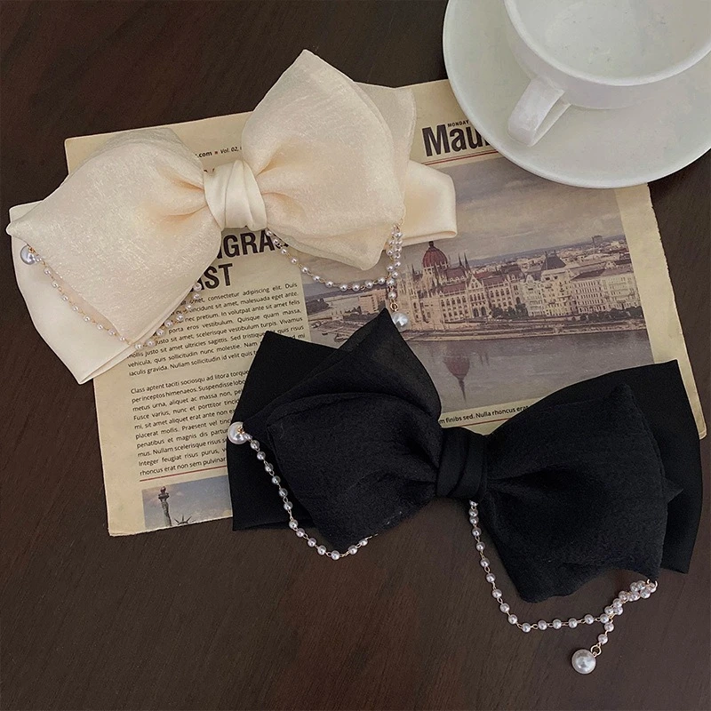 

Изысканная корейская французская заколка для волос с жемчужным кулоном и бантом, высококачественная пружинная заколка для затылка, элегантный аксессуар для волос для женщин