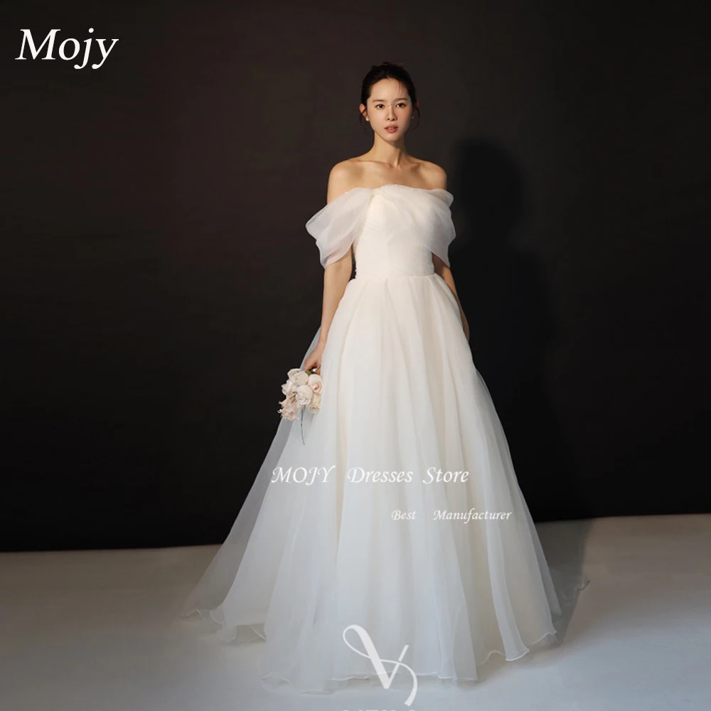 Fabric of Wedding Dresses: What Makes Mojy's Organza & Tulle Gown Stand Out  in Real-World
