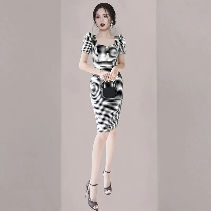 High End Professional Temperament Plaid Bubble Sleeve Dress 2024 Summer New Goddess Style Niche Light Luxury Wrap Hip Skirt