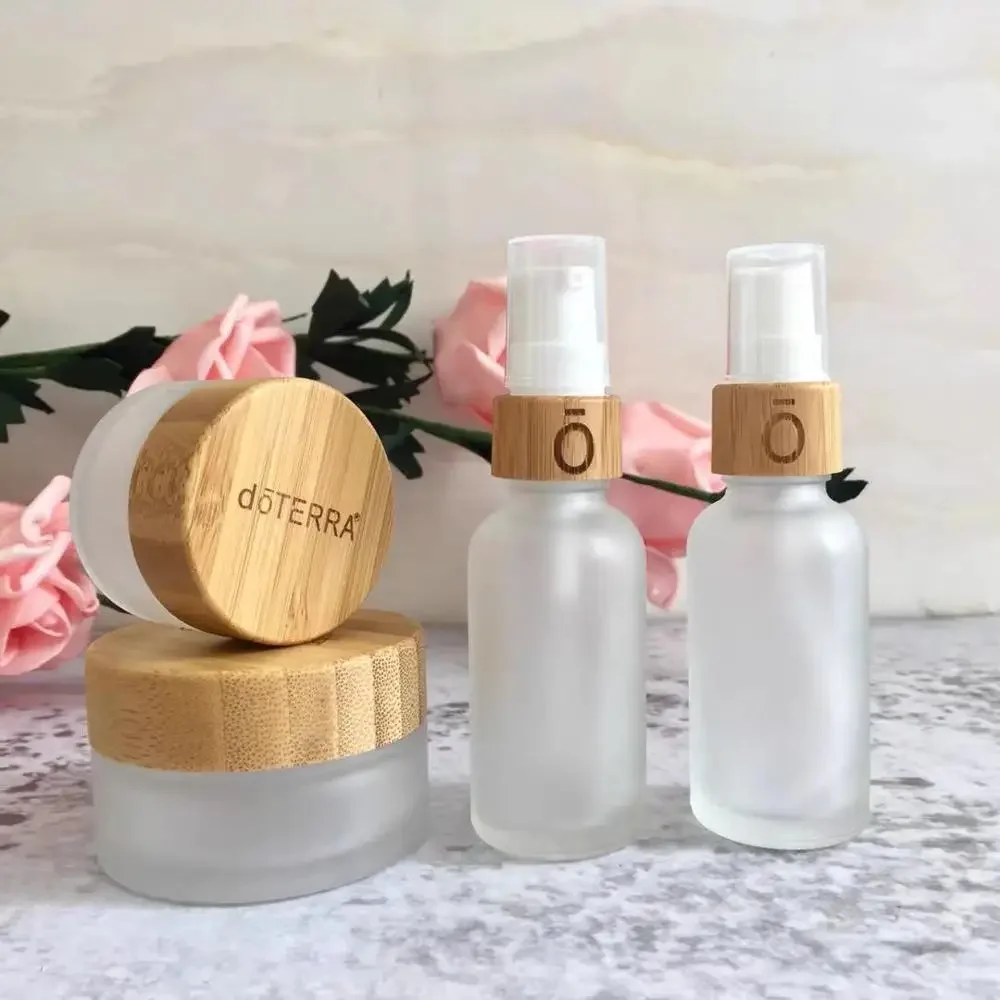 

made in china engraving logo sample Frost Glass Bottle Plastic Bamboo Lid Glass Jar Empty Bottle Cream Jar Cosmetic container