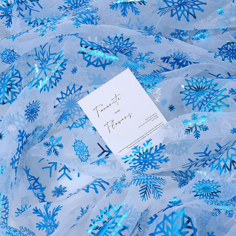 Organza bronceado azul gran copo de nieve tela navideña ropa para niños juguetes ropa de rendimiento tela