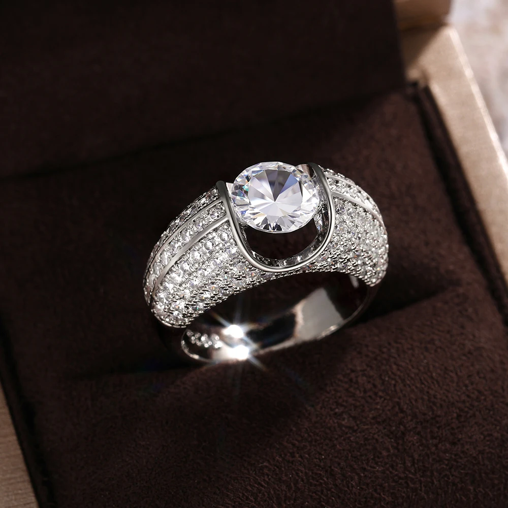 Huitan Sanfter Damenring in Silberfarbe, modisch, für Hochzeit, Verlobung, zarte Accessoires, eingelegter runder, glänzender CZ-Schmuck, ausgefallenes Schmuckgeschenk