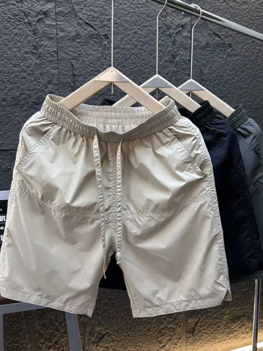 

Ice Silk Qui Dry Lightweight Summer Casual orts Men's Beachwear Five-Quarter Length Breathable Hollow out Design Youthful...