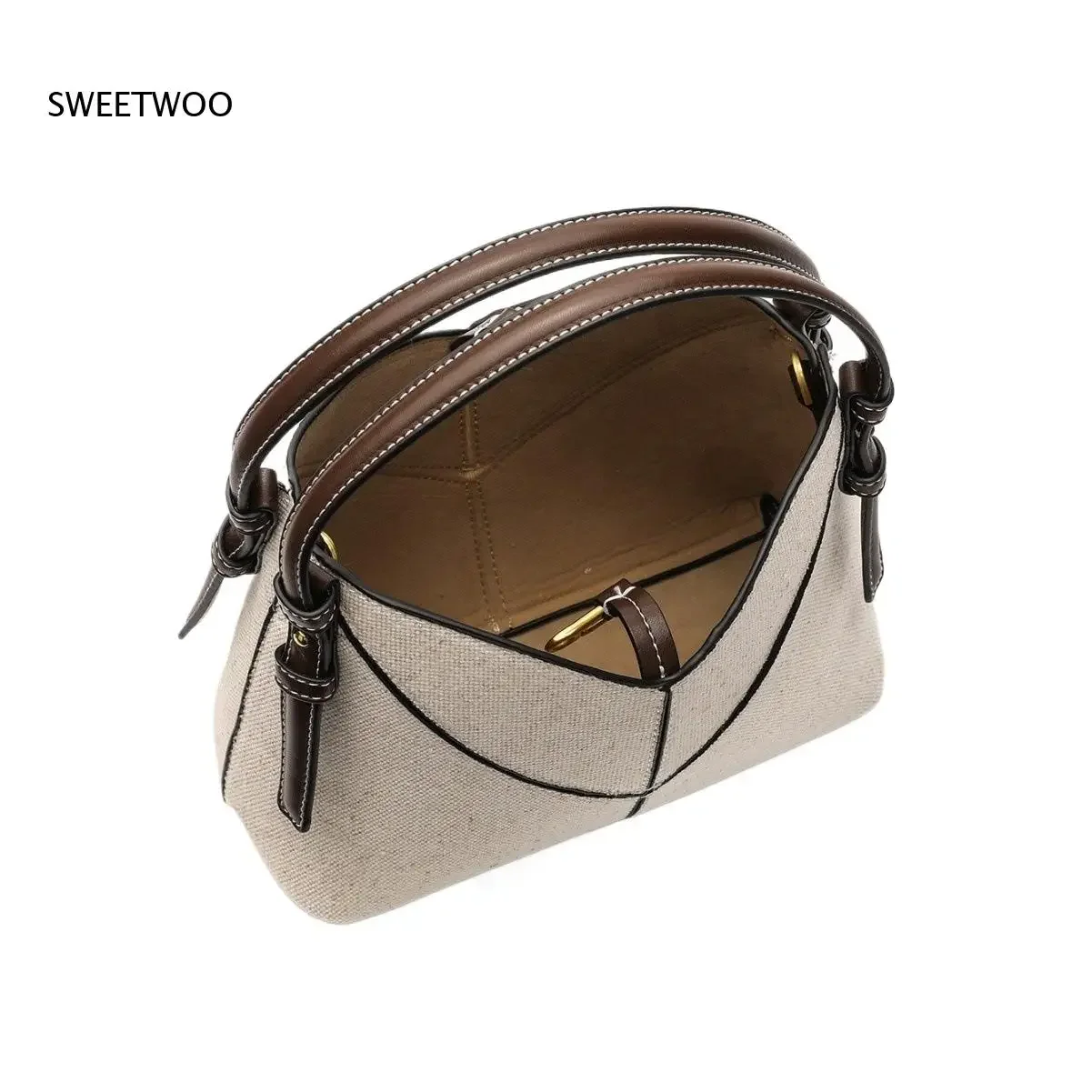 

Canvas Top Handle Bag with Leather Trim Geometric Stitching Design Suitable for Daily Commute Travel and Casual Outings 2026