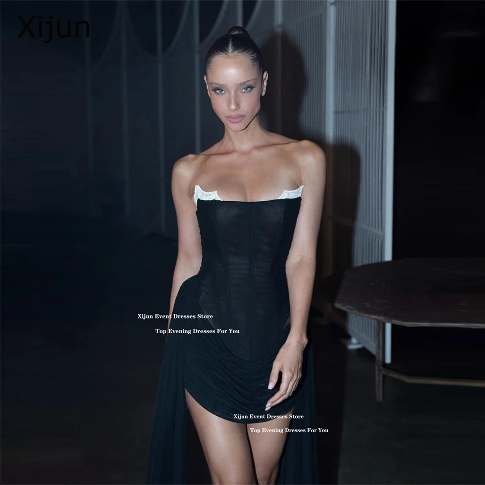 فساتين سهرة قصيرة سوداء حديثة من Xijun بدون أكمام مطوي لحفلات أعياد الميلاد بدون حمالات فساتين حفلات رسمية قصيرة مخصصة