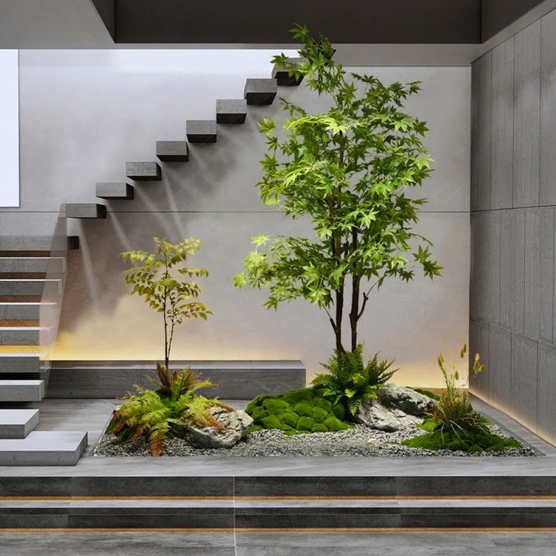 Landscaping simulation under the rotating staircase, green plants, maple rockery, stone combination landscaping, indoor stone la